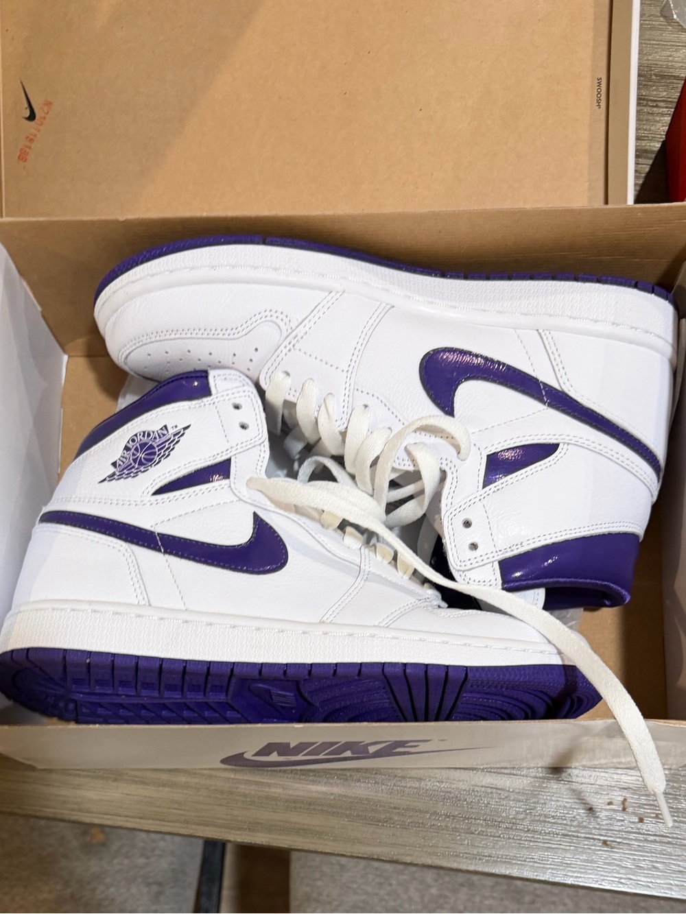 Jordan White and Purple Mid-Top Sneakers